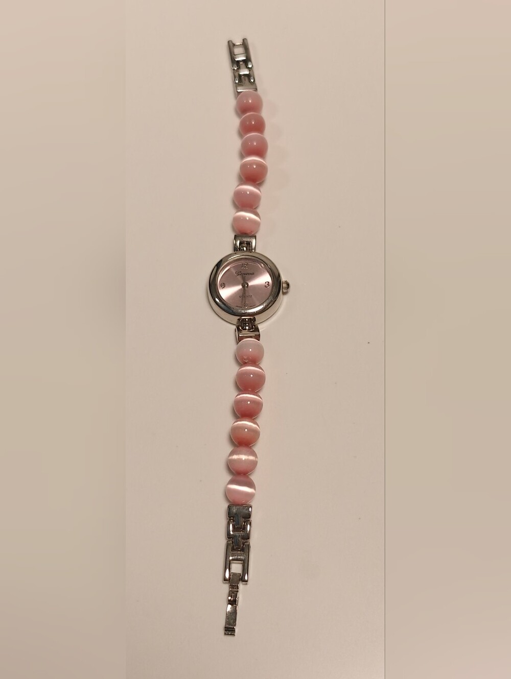 Geneva Pink Face Quartz watch features pink stone Bead Silver Band Vintage Y2K